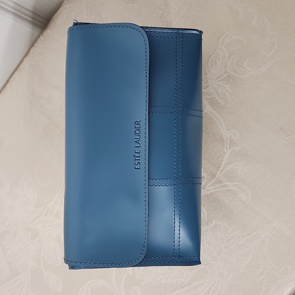 Estee Lauder Handbags - Estee Lauder blue cosmetic bag hook and loop fasteners
